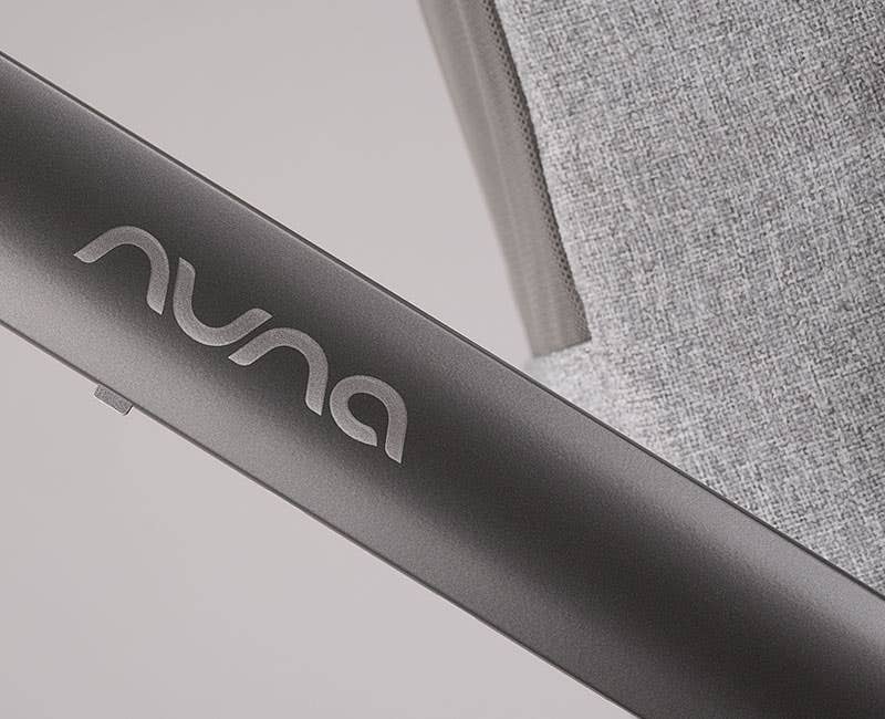 Close up of matte gray DEMI next stroller frame from Nuna's Sterling Collection